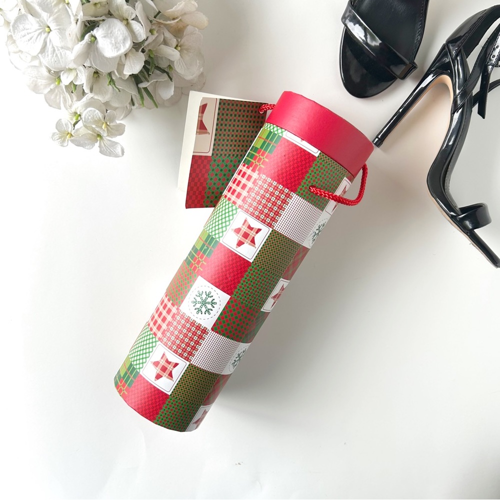 Christmas Themed Wine Bottle Sleeve Gift Wrap filled with pine cones